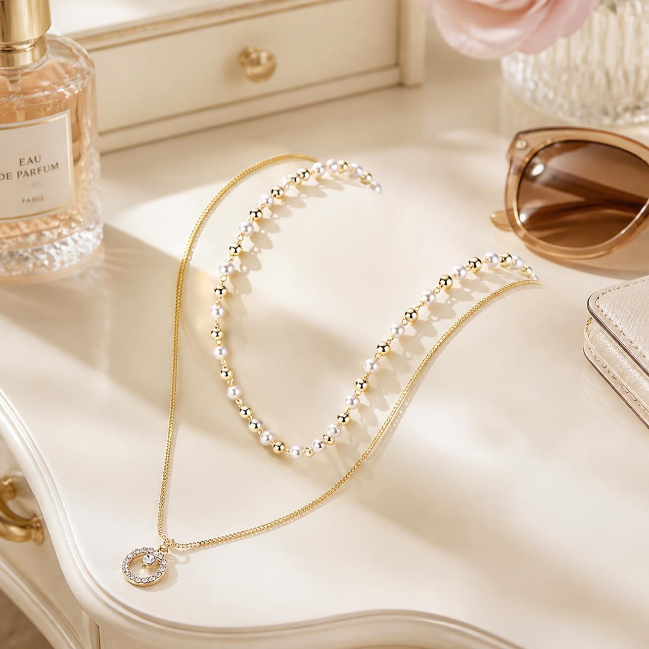 Collier anneau à perles jumelles, bijou délicat et raffiné